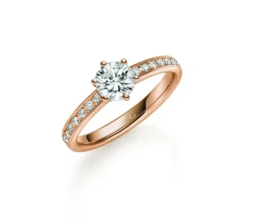 Roségold-Verlobungsring mit Solitär-Diamant und zarten Diamanten entlang des Bandes, ein eleganter und romantischer Ring.