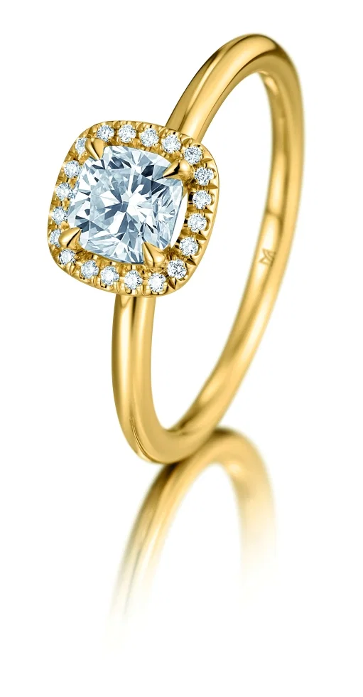 In diesem Ring von Meister wird der Diamant im Cushion-Schliff von Brillanten umgeben.